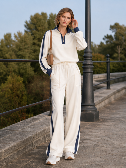 Off-white Half-zip Mock-neck Top And Wide-leg Pants Set With Contrasting Piping.