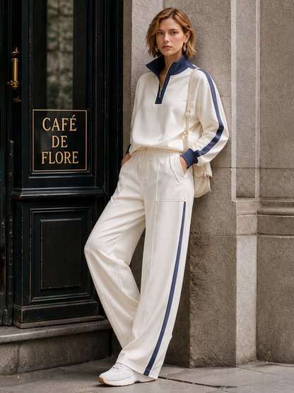 Off-white Half-zip Mock-neck Top And Wide-leg Pants Set With Contrasting Piping.
